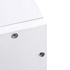 Close-up of white wall rack panel with mounting holes and metal bracket