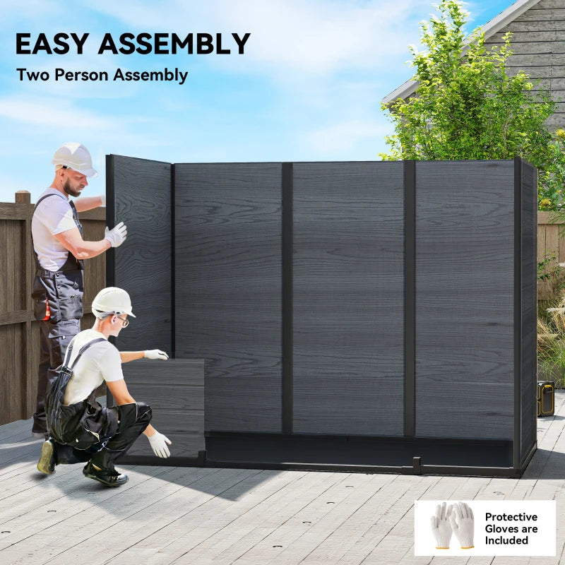 Dark grey resin garden shed during assembly with side panels in place