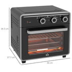 Black mini convection oven front view with open door and illuminated heating chamber