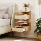 Oak-toned floating bedside table on wall with open shelves and pull-out drawer, light wood finish