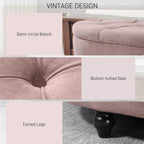 Light pink tufted storage ottoman bench with turned black legs