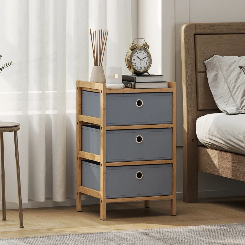 Compact light grey fabric drawer dresser with bamboo frame and three round pull handles
