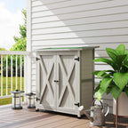 Light grey wooden storage shed with front door open and cross-brace detail