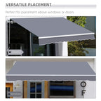 Grey retractable awning above windows or doors with scalloped valance