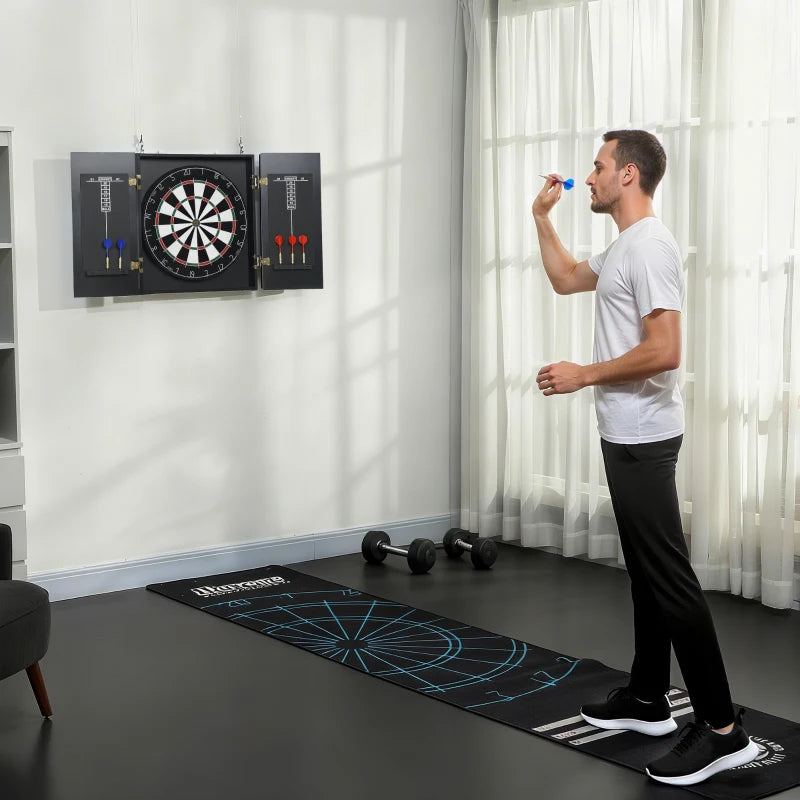 Wall-mounted bristle dartboard cabinet with steel-tip darts and blue floor throw mat.