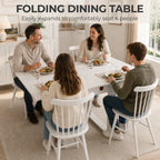 White folding dining table for four with lower storage rail, set for meals