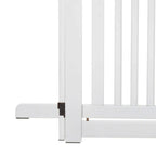 White dog gate base foot and lower latch at the bottom of vertical slats