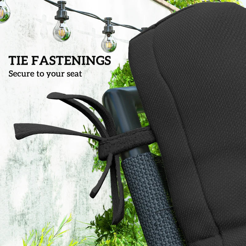 Black cushion with tie fastenings for securing to patio chair