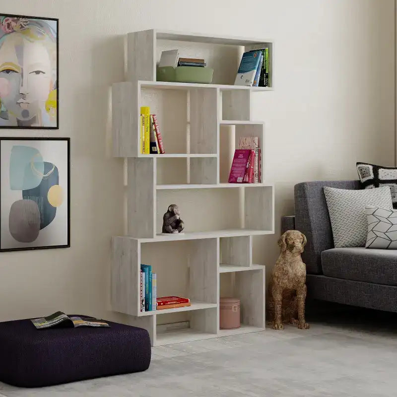 Tall white bookcase display unit with open cubby shelves and top open book storage