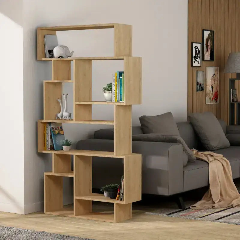 Tall modern bookcase display unit in light wood with open cubby shelves and central frame