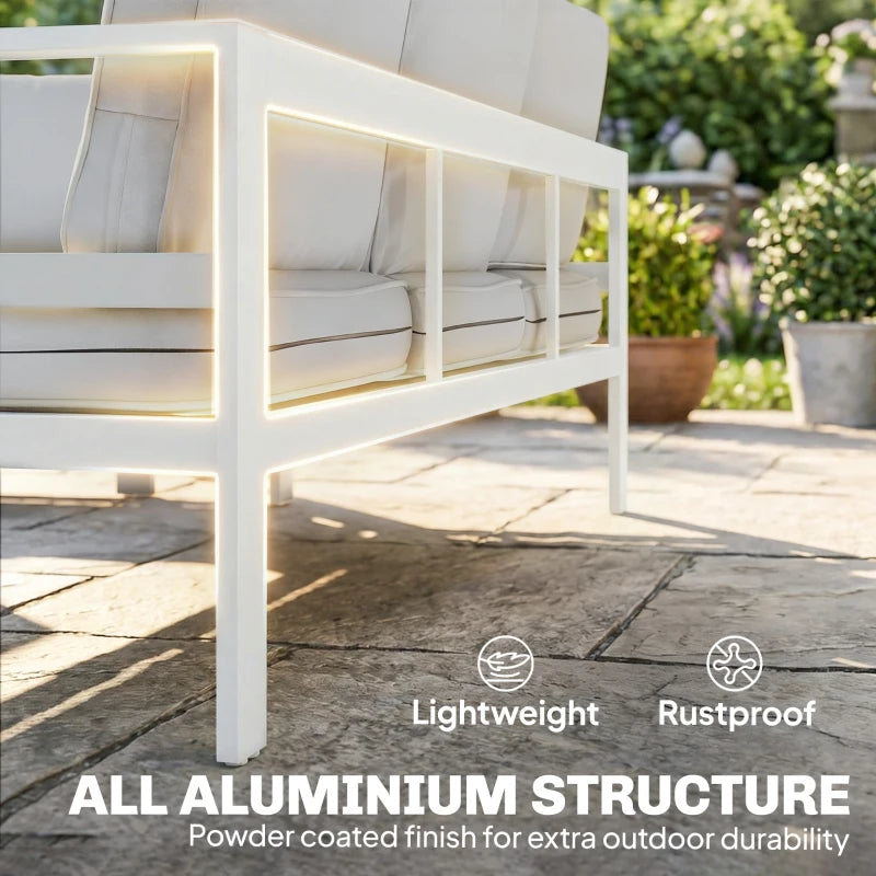 White outdoor armchair with gray cushions and open-style white frame