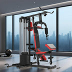 Black multi gym machine with red bench pad, weight stack columns, and cable attachments