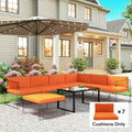 Orange outdoor dining sectional cushions on metal frame with seat cushions