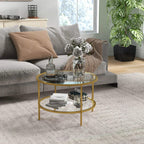 Gold-tone round 2-tier tempered-glass coffee table in living room, steel frame with open lower shelf