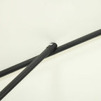 Black parasol pole close-up with connector sleeve for secure setup