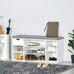 White shoe storage bench with grey cushioned top and open compartments for shoes