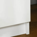 White bedside table corner with straight base leg and smooth high-gloss panels