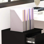Black top surface with built-in pencil tray holding upright file folders in a divider