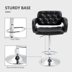 Black tufted PU leather swivel bar stool with sturdy round metal base and footrest