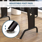 Black desk leg with adjustable foot pad for stability on uneven floors.