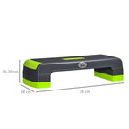 Grey and green aerobic step, 3 adjustable heights; 78 cm x 28 cm x 10–20 cm.