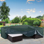 Green patio furniture cover with draped sides over a square outdoor table and benches.