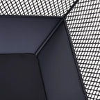 Close-up of black fire pit lid edge with mesh side panel
