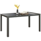 Grey aluminium dining table with clear glass tabletop and straight metal legs