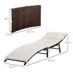 Cream cushioned folding sun lounger chair with matching pillow and rattan frame