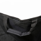 Black folding camping chair seat pocket with fabric divider and reinforced stitching