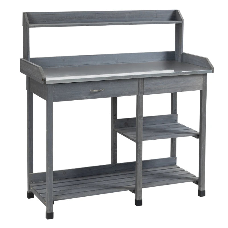 Grey potting workbench table with open shelf, drawer, and slatted lower storage rack