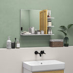 Wall-mounted bathroom mirror with bamboo shelf panel over sink and toiletries