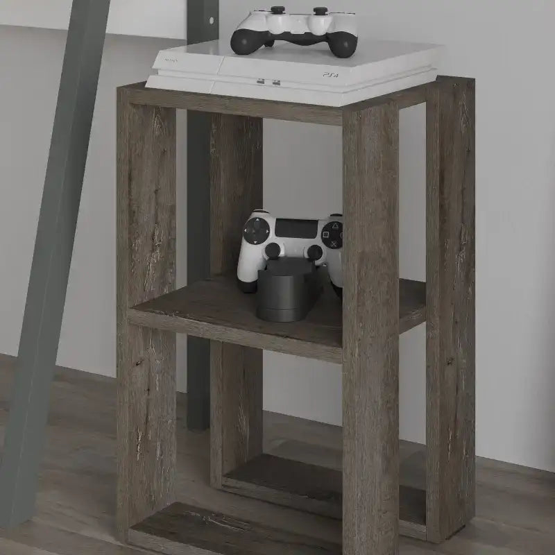 Modern bedside table with open shelves, grey oak-effect finish, holds game console