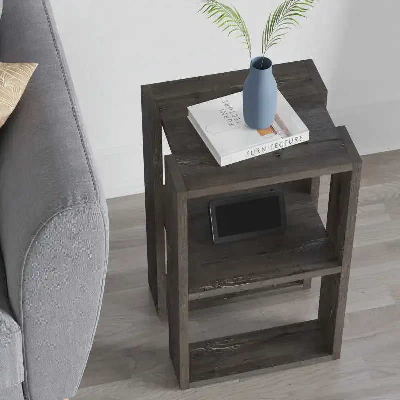 Dark wood bedside table with two open shelves and top surface, compact square design.