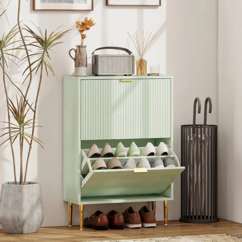 Light green shoe cabinet with open top tier and shoes stored in ridged drawer