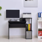 Black computer desk with monitor stand area, sliding tray, shelf storage, and side drawer