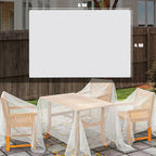 White mesh tarpaulin stretched as cover over outdoor patio table and chairs