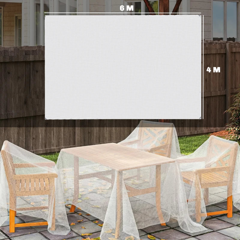 White mesh tarpaulin stretched as cover over outdoor patio table and chairs