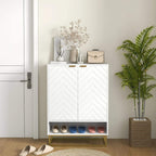 White shoe storage cabinet with open shelf and chevron doors, shoes stored on tiers