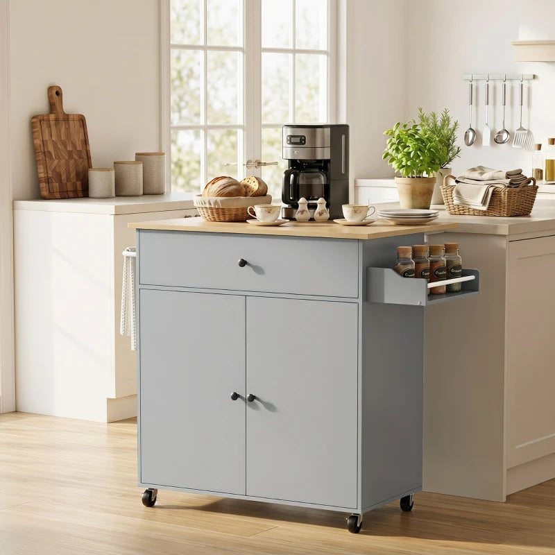 Grey rolling kitchen island with drop-leaf top, drawer, cabinet doors, and side shelf