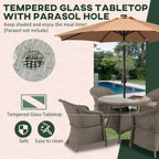 Grey PE rattan dining table with tempered glass top and parasol hole, plus chairs