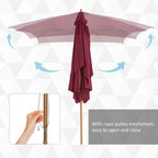 Wine red parasol with hanging cover and rope pulley for opening and closing.