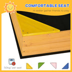 Kids wooden sand pit with four seat panels and black fabric underside, pink cover