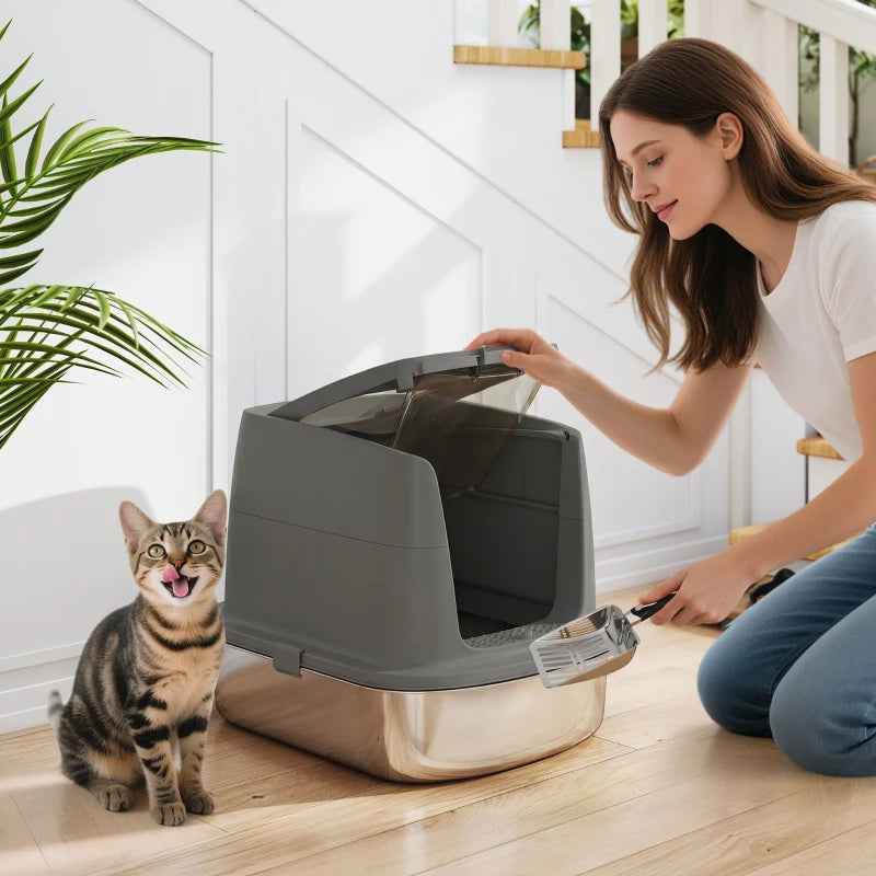 Dark grey enclosed cat litter box with scoop and open top for easy access