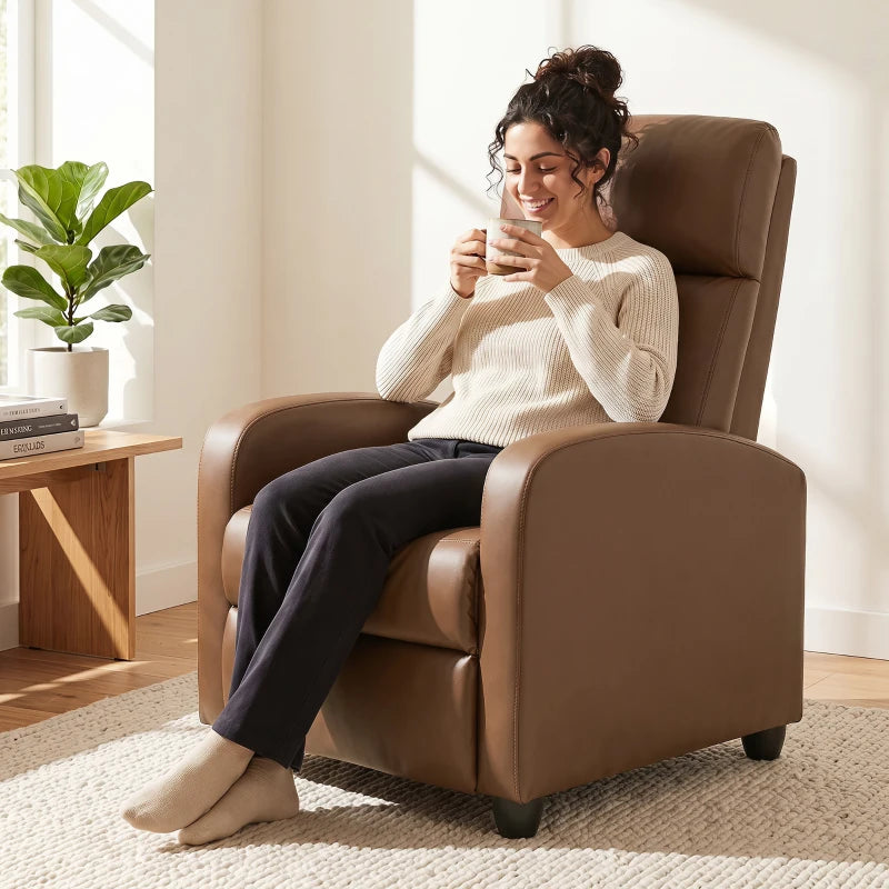 Dark brown recliner armchair with extended leg rest and side pocket