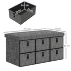 Dark grey shoe storage bench with padded top and six fabric drawers
