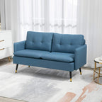 Blue two-seat sofa with tufted back cushions, rolled arms, and steel legs