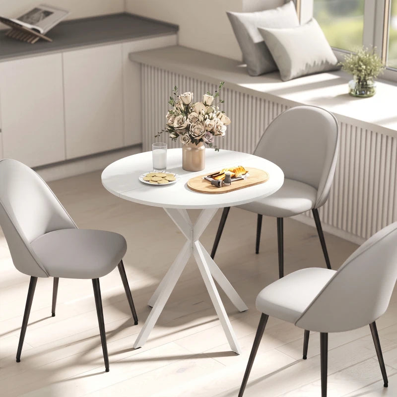 White round dining table with white top and angled legs for drinks and snacks