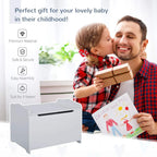 Grey kids toy box storage chest next to a family gift scene with open lid.