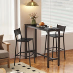 Black marble-effect bar table with metal legs, bar-height dining setting